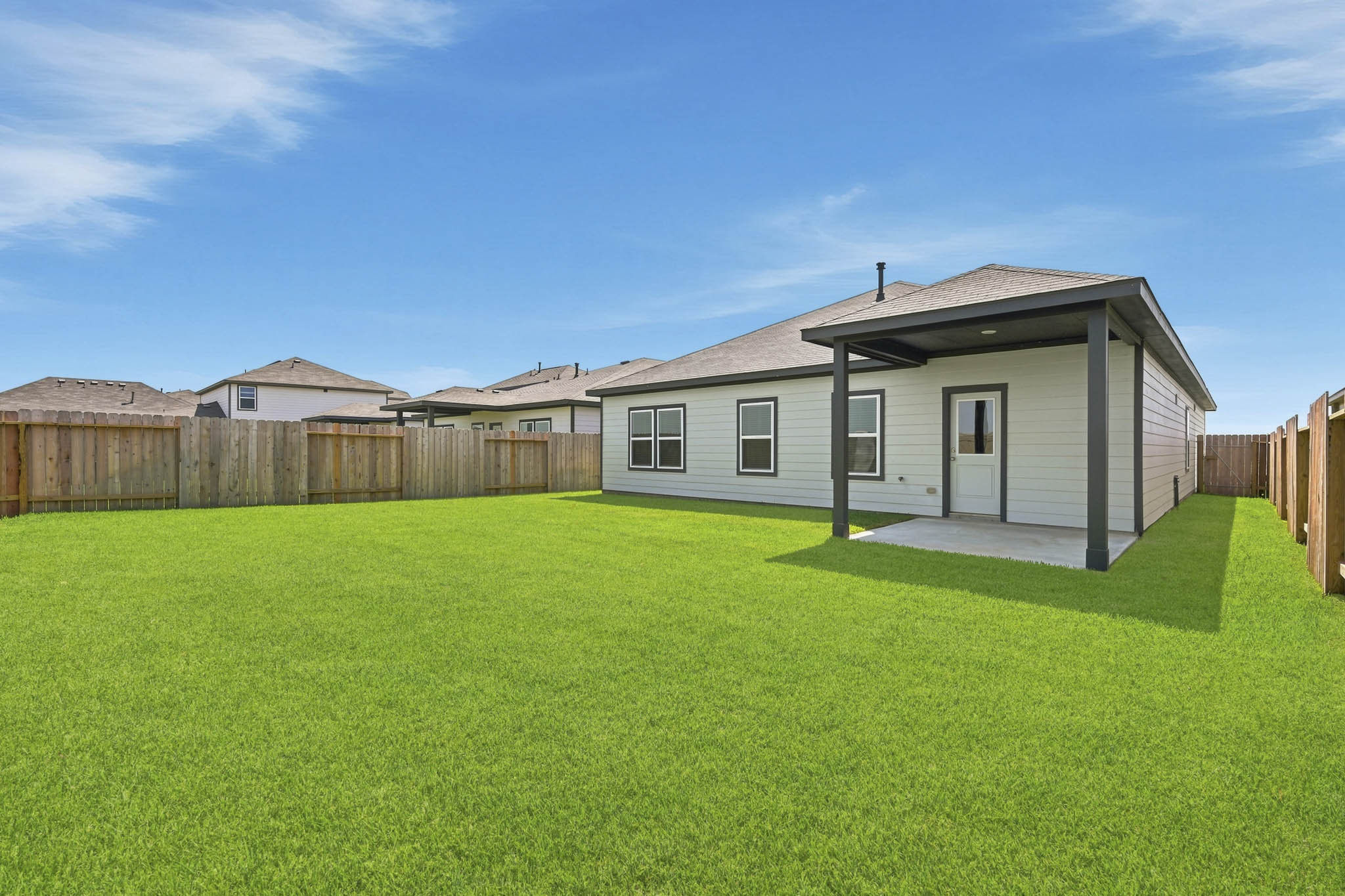 A house with a fence around it.