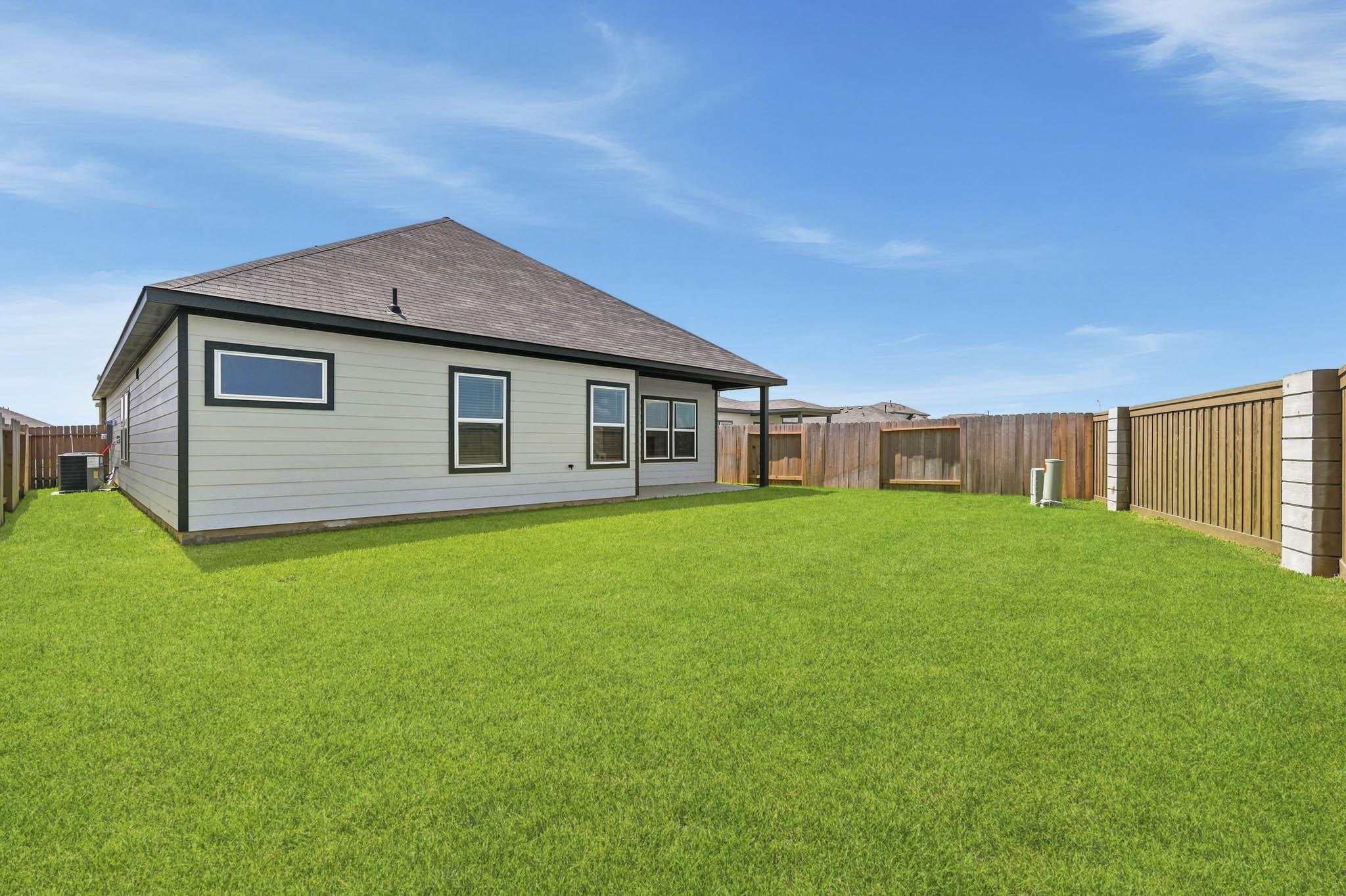 A house with a fence around it.