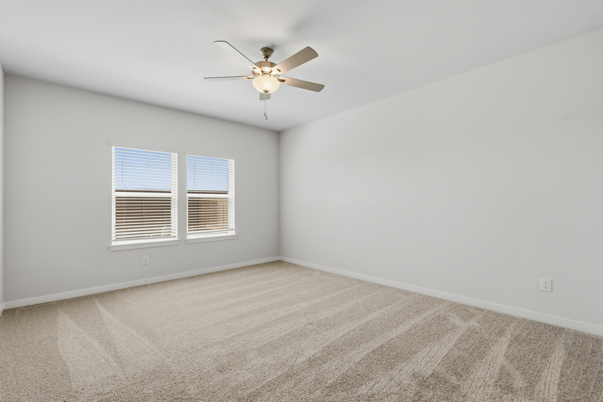 A ceiling fan in a room.