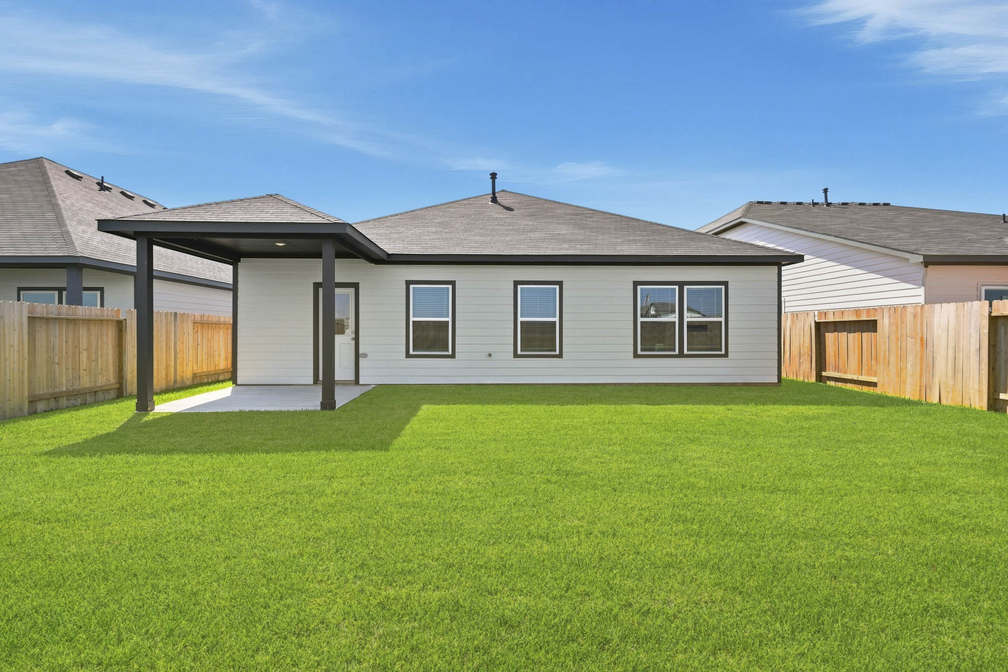 A house with a fence around it.