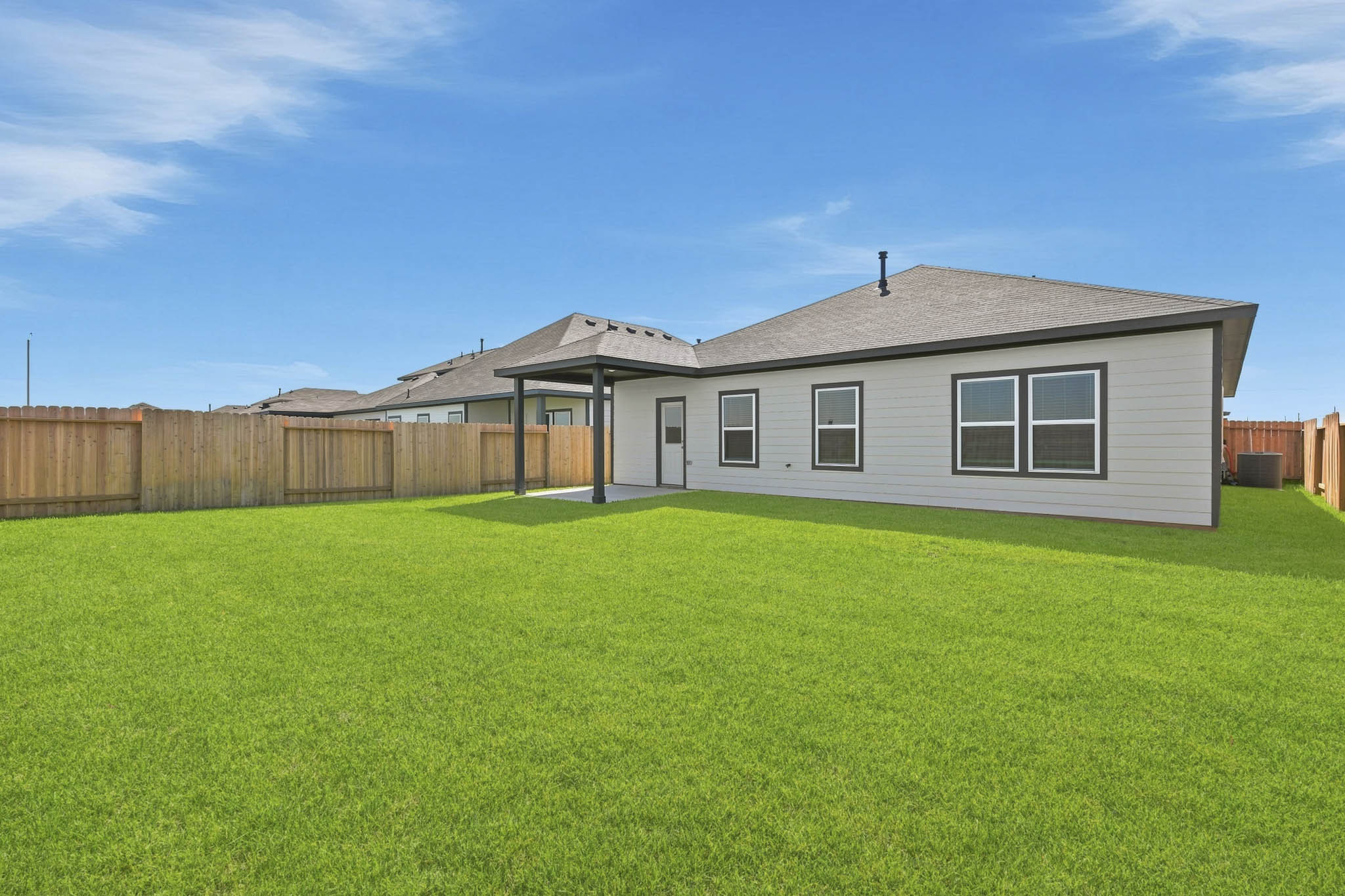 A house with a fence around it.
