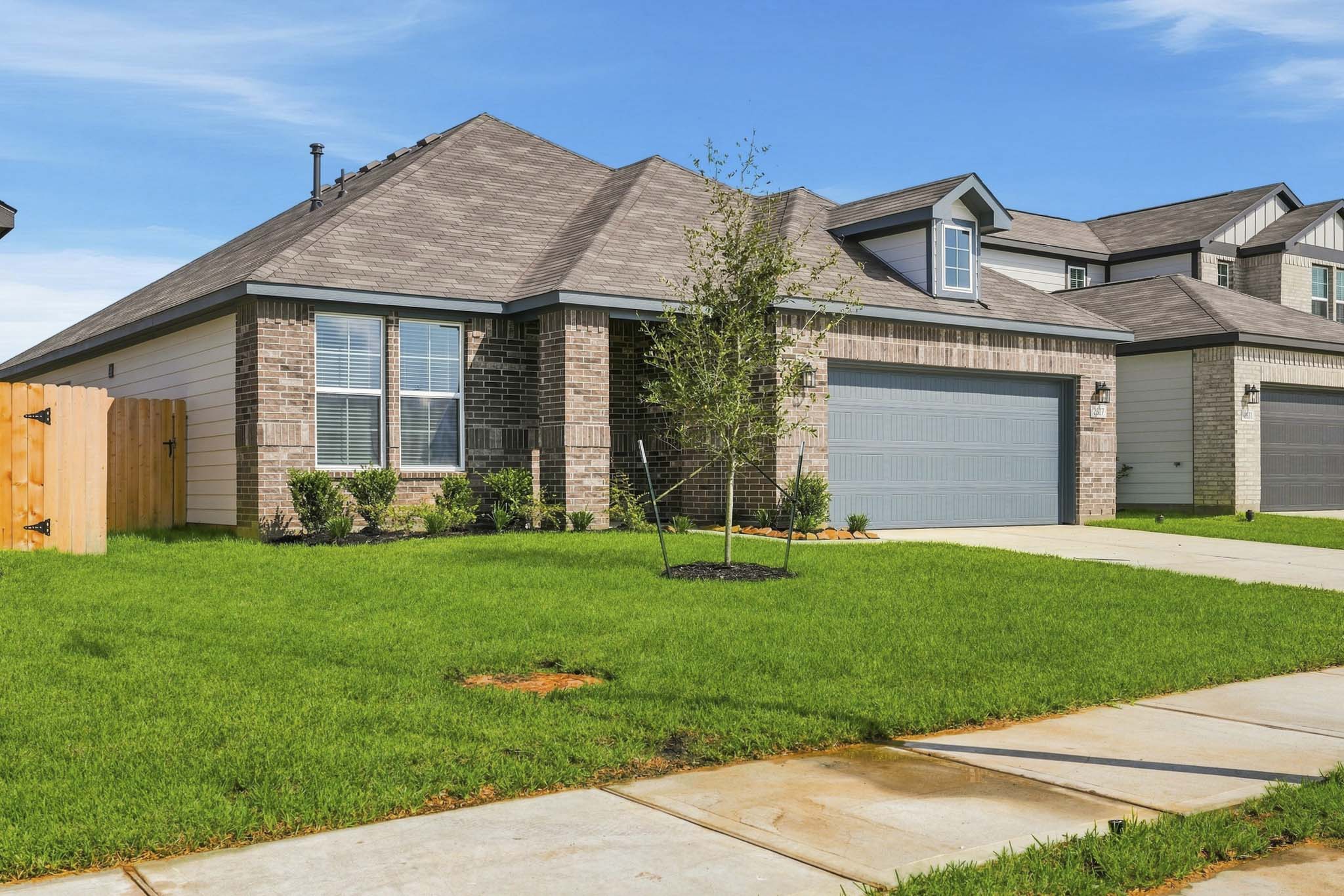 A house with a large front yard.