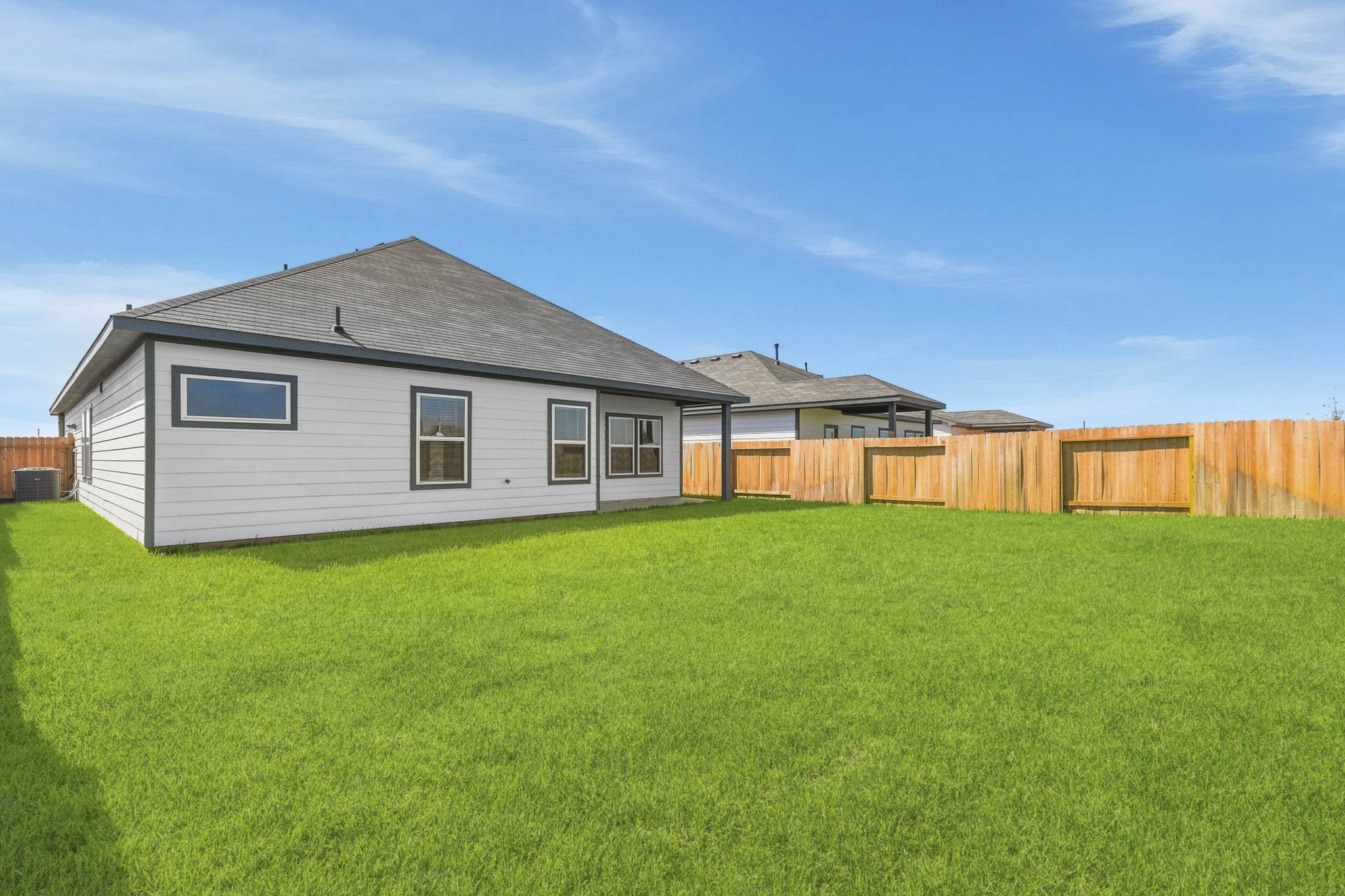 A house with a fence around it.