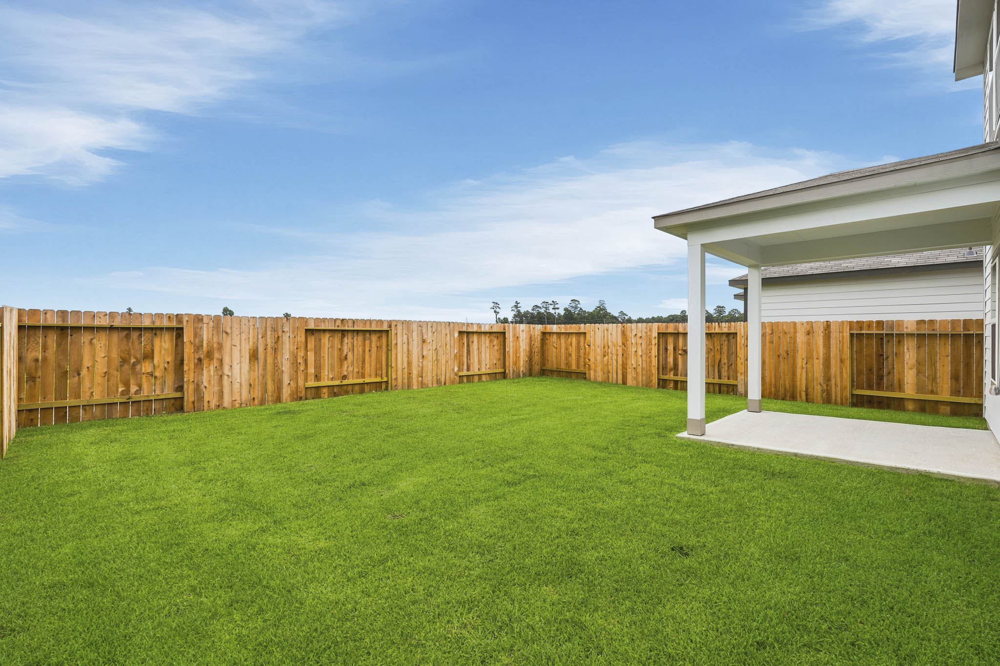 A fenced in lawn.
