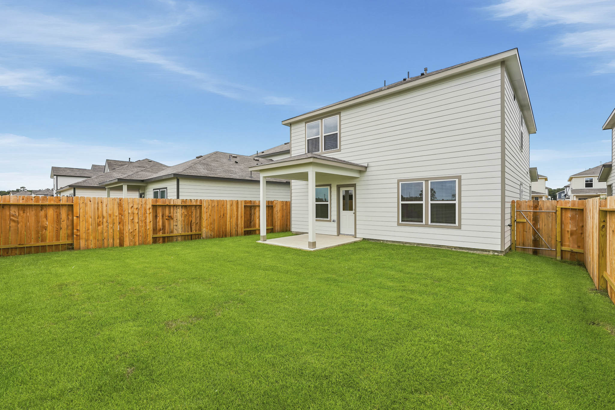 A house with a fence around it.