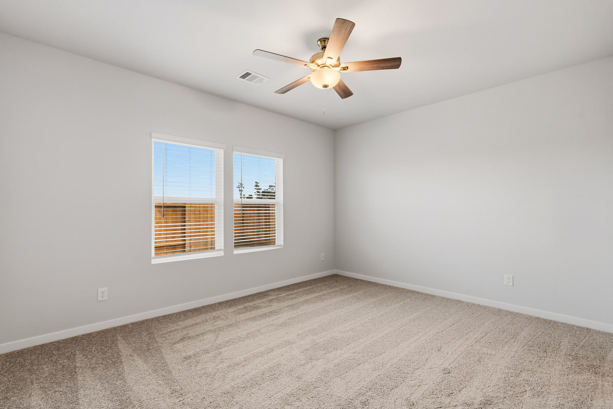 A ceiling fan in a room.