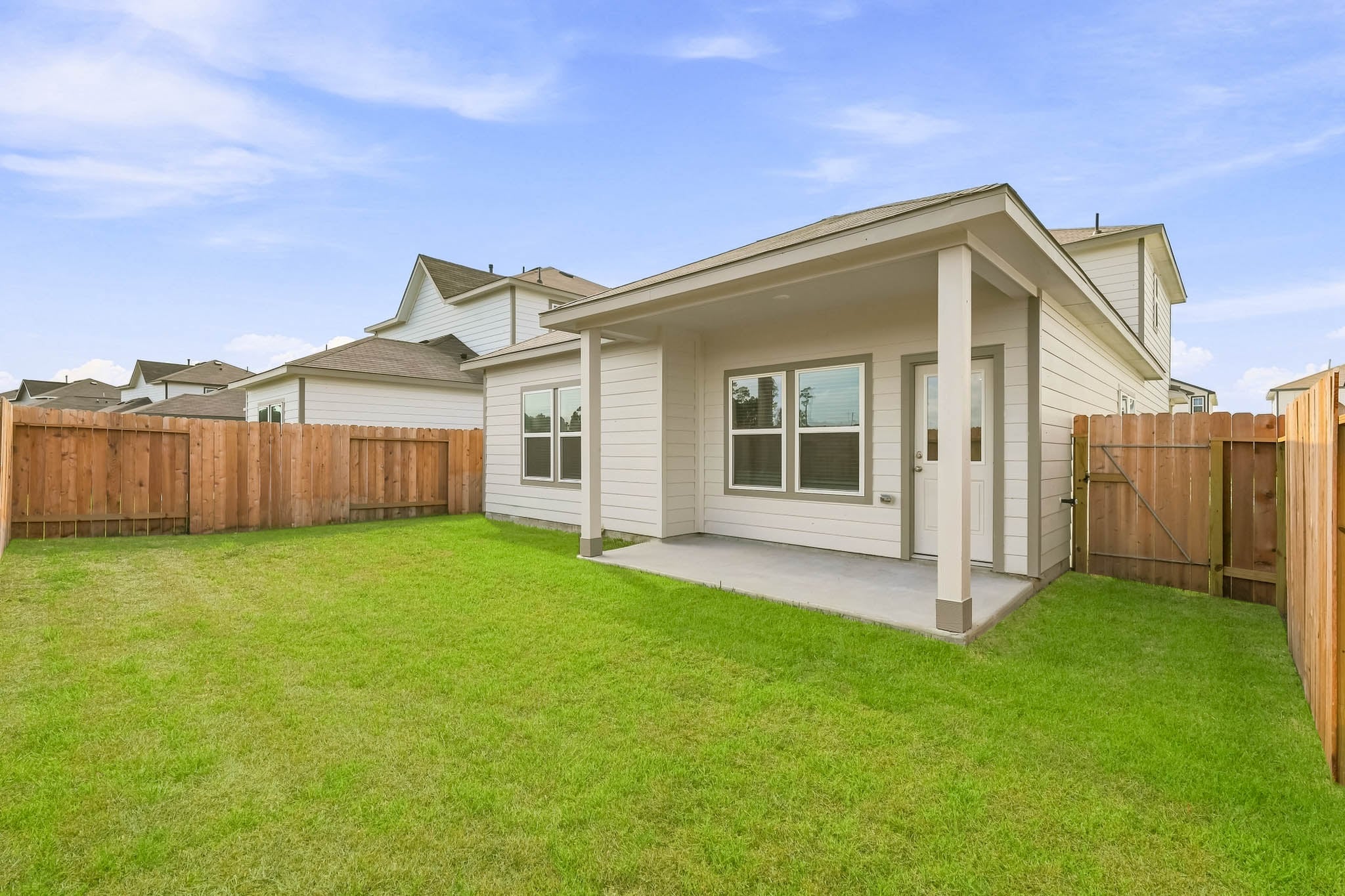A house with a fence around it.