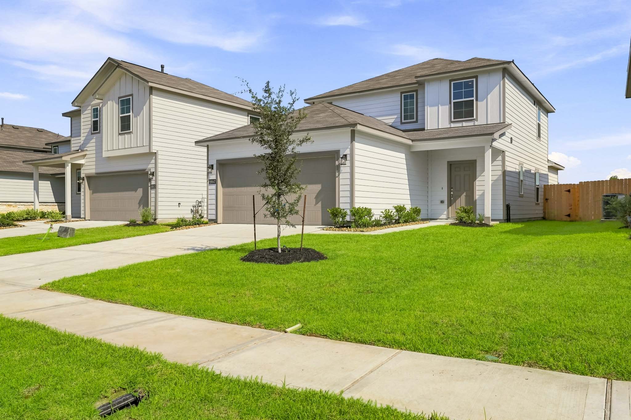 A house with a large front yard.