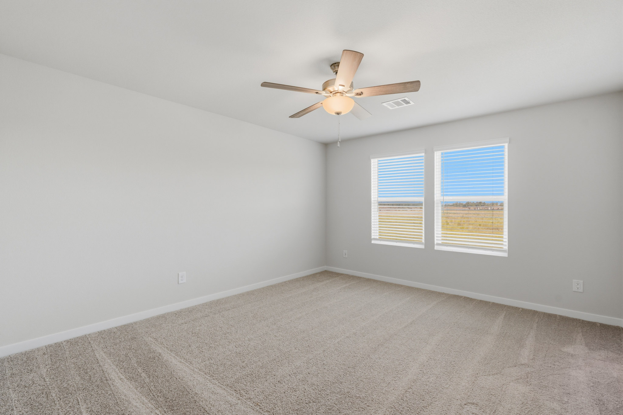 A ceiling fan in a room.