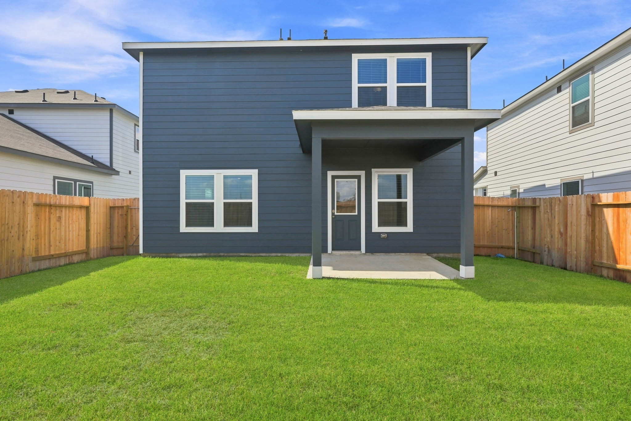 A house with a fence around it.