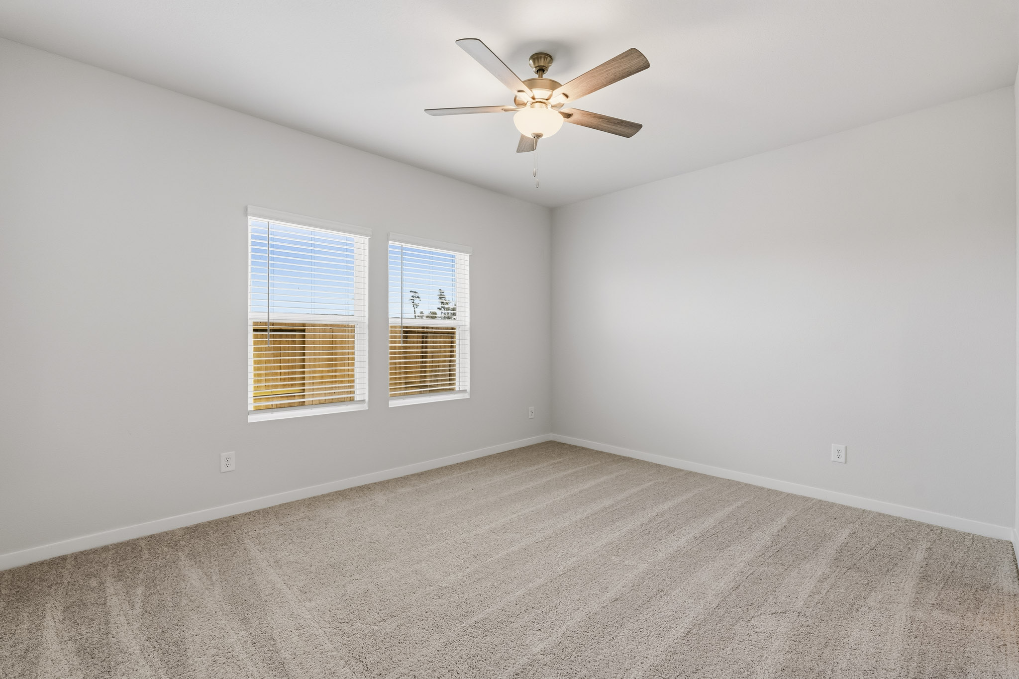 A ceiling fan in a room.