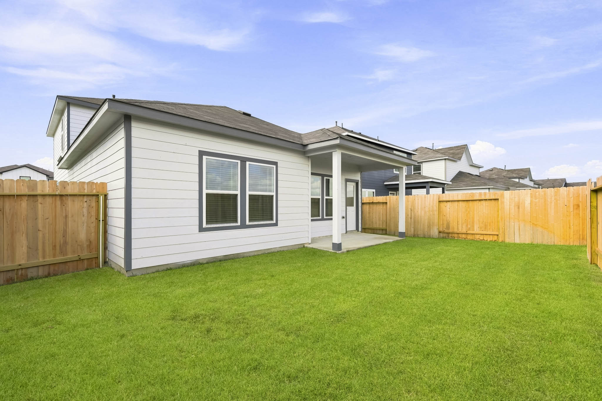 A house with a fence around it.