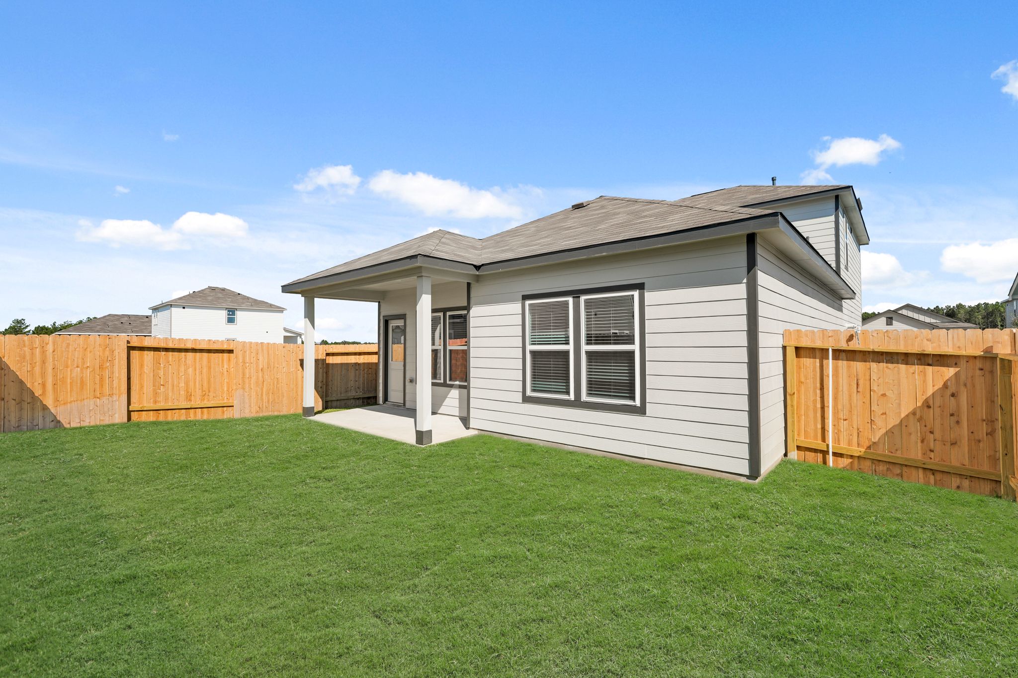A house with a fence around it.