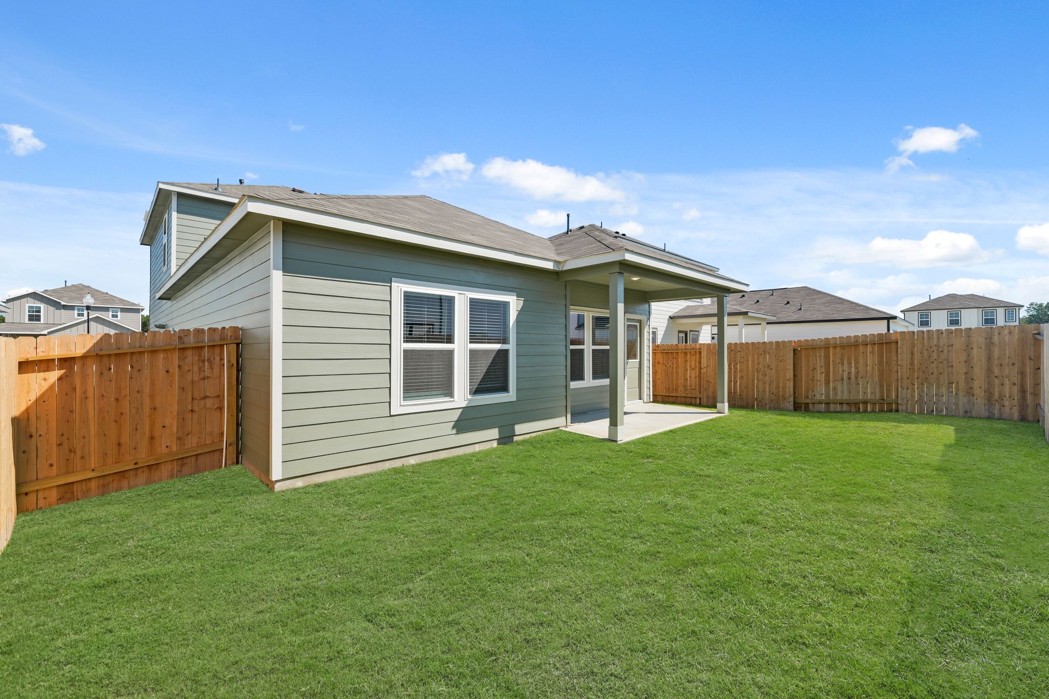 A house with a fence around it.