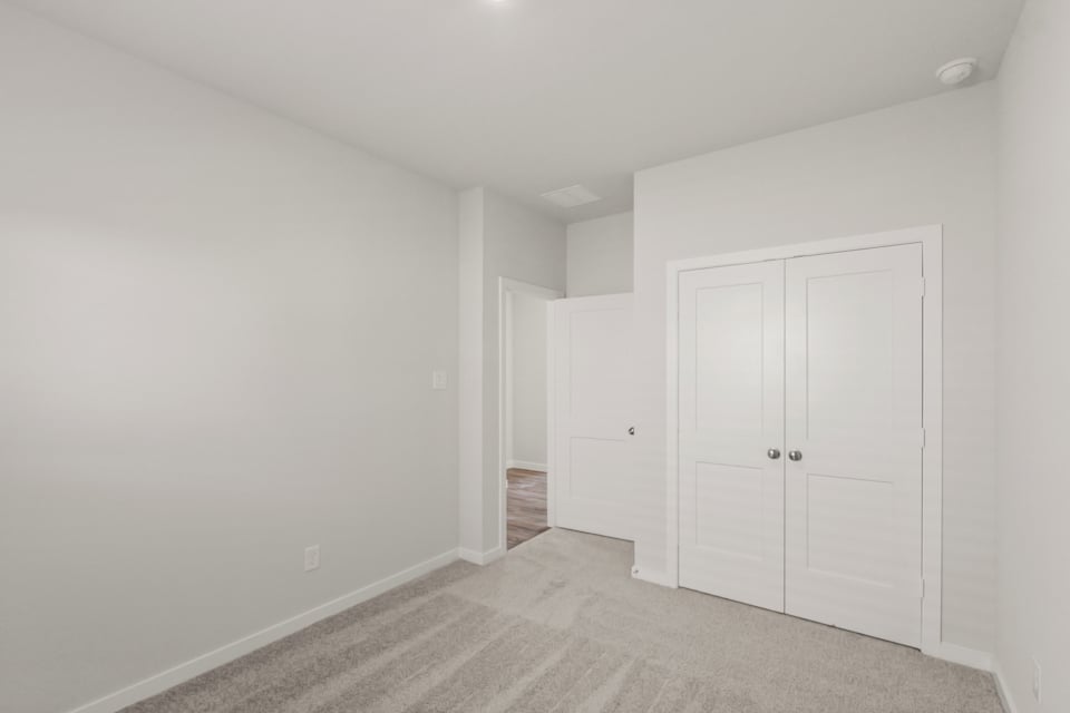 A room with white doors.