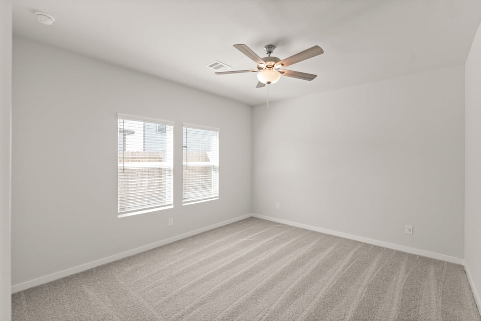 A ceiling fan in a room.