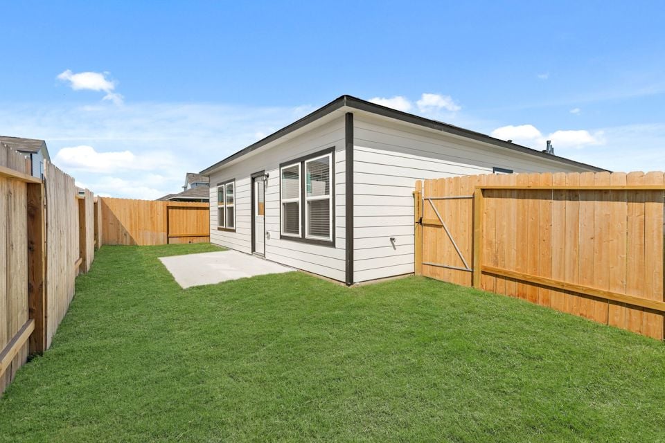 A house with a fence around it.