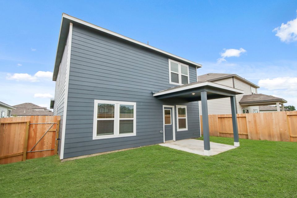 A house with a fence around it.