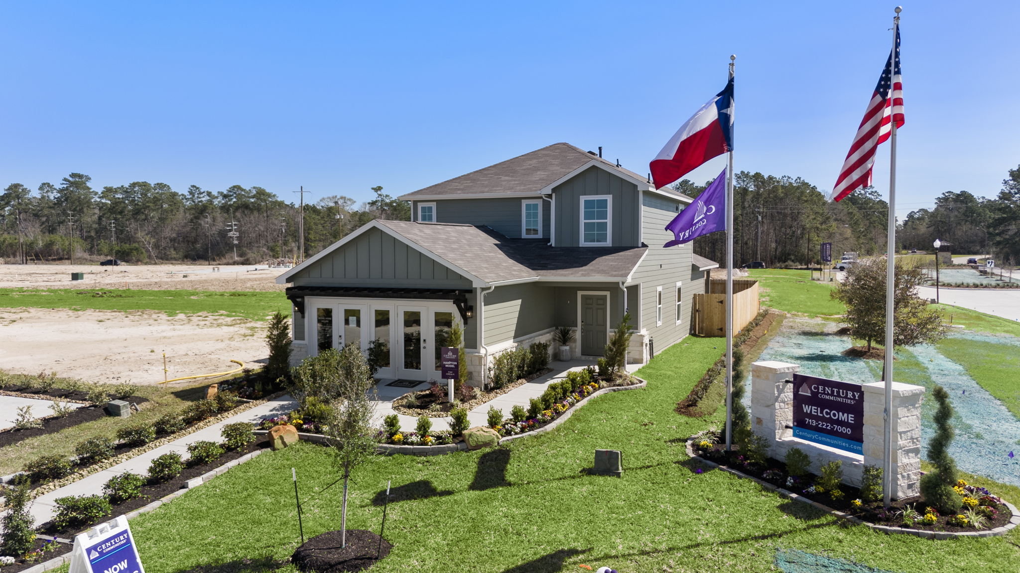 A house with flags in front.