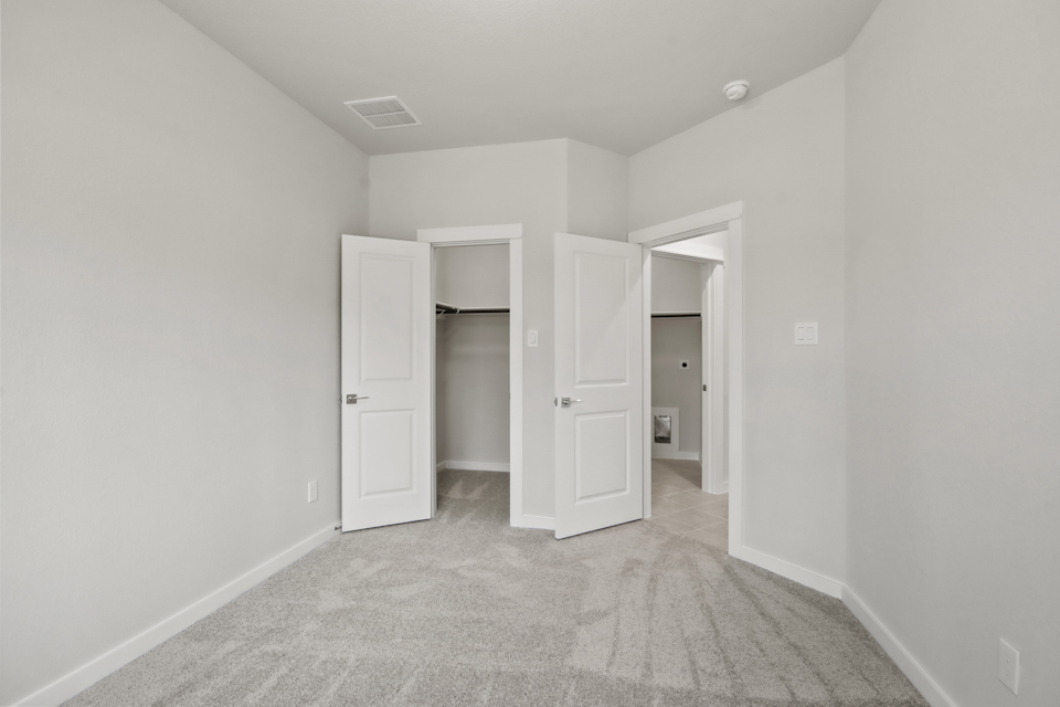 A room with white doors.