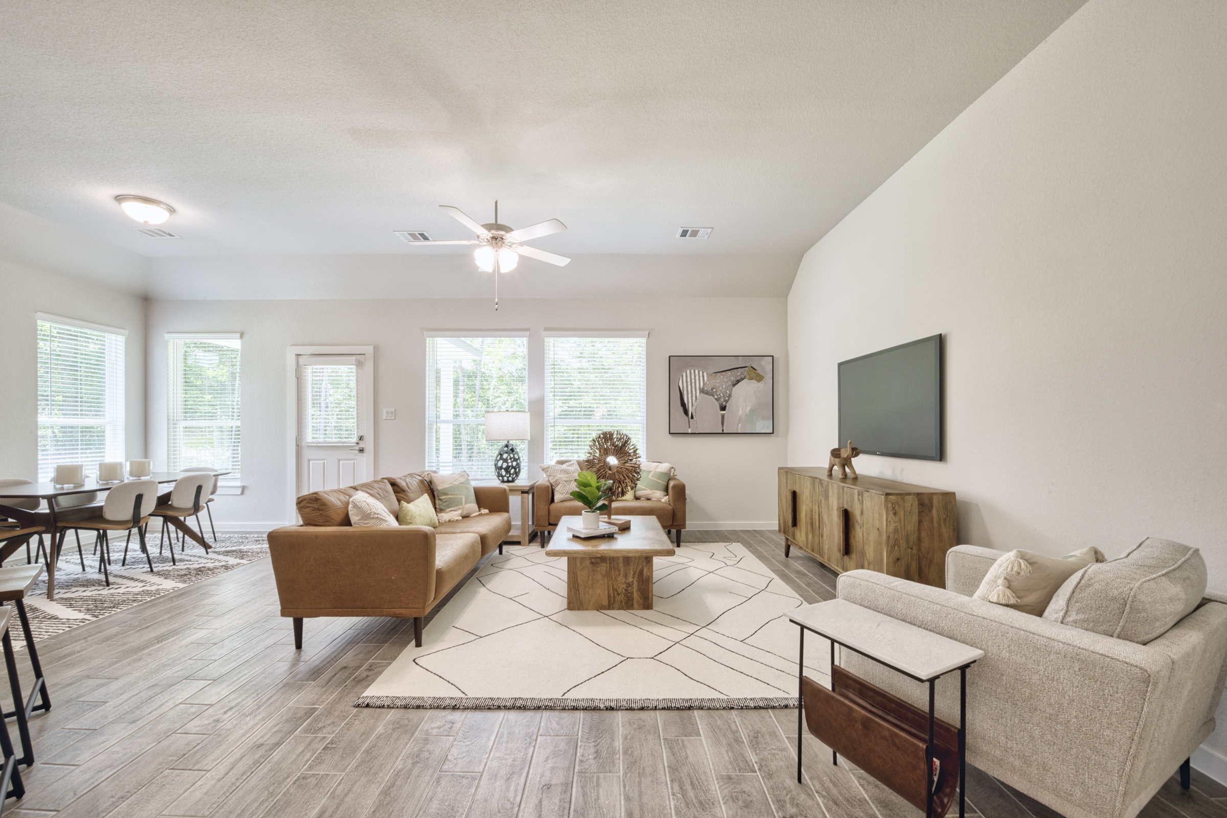 A living room with a large window.