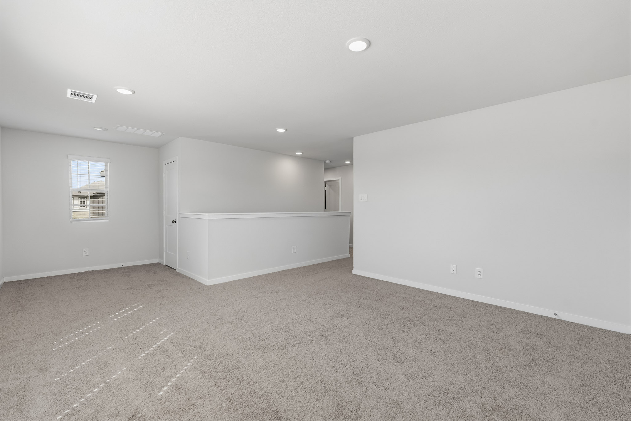 A room with white walls.