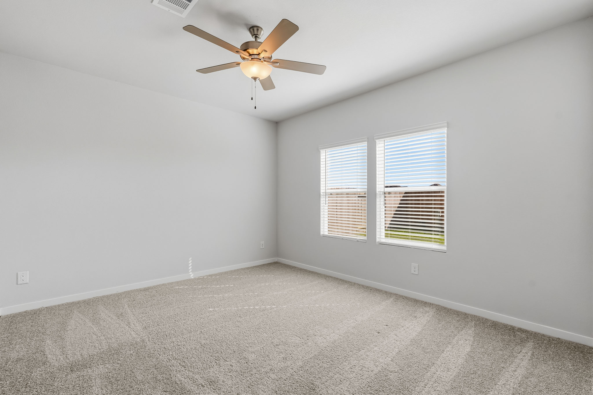 A ceiling fan in a room.