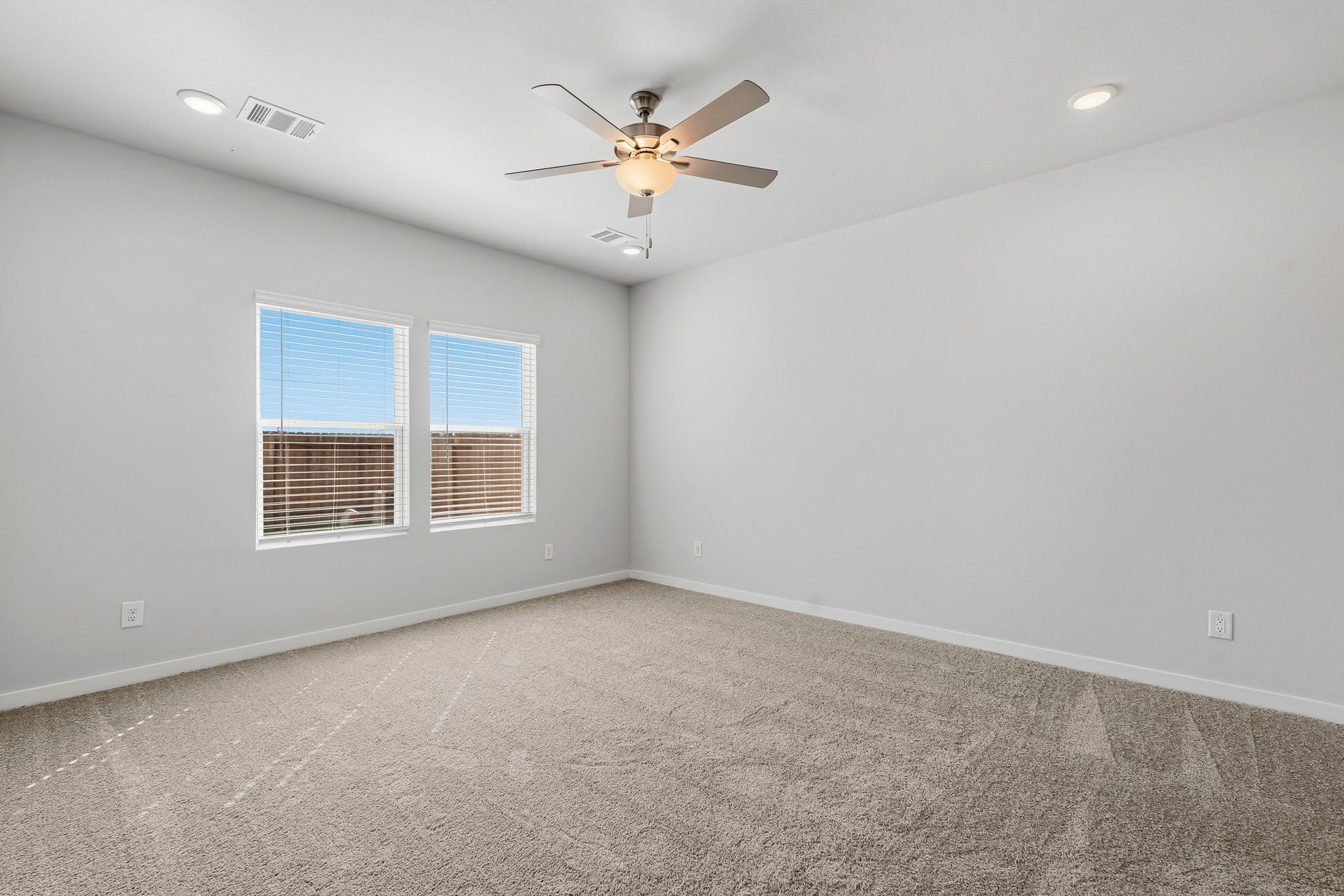 A ceiling fan in a room.