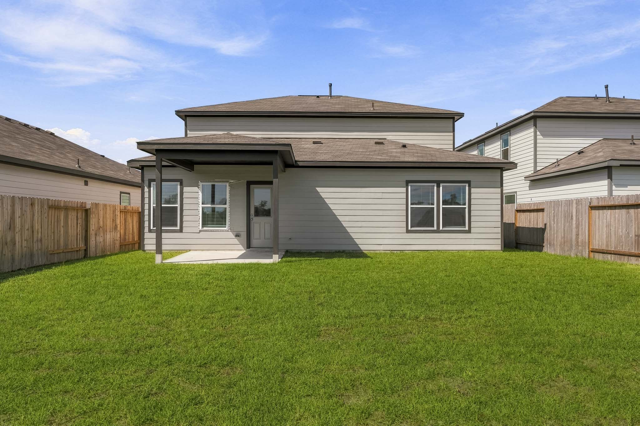 A house with a fence around it.
