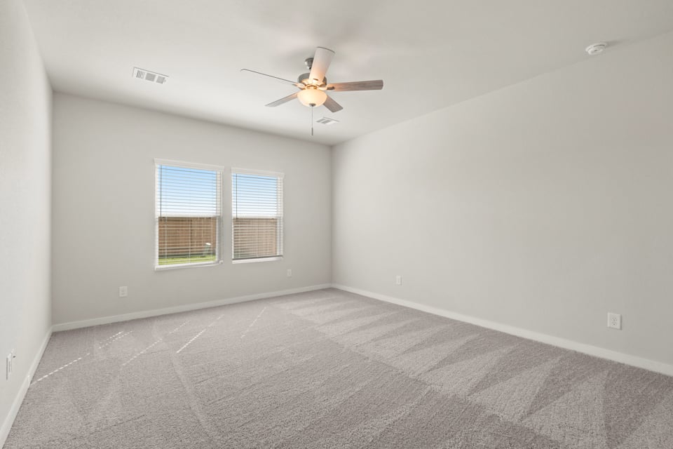 A ceiling fan in a room.