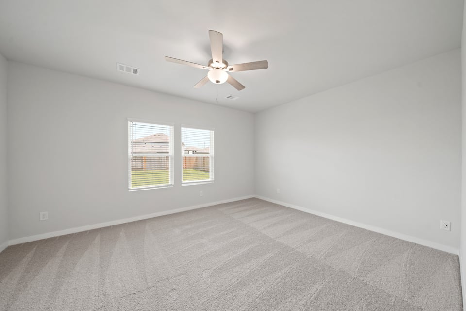 A ceiling fan in a room.