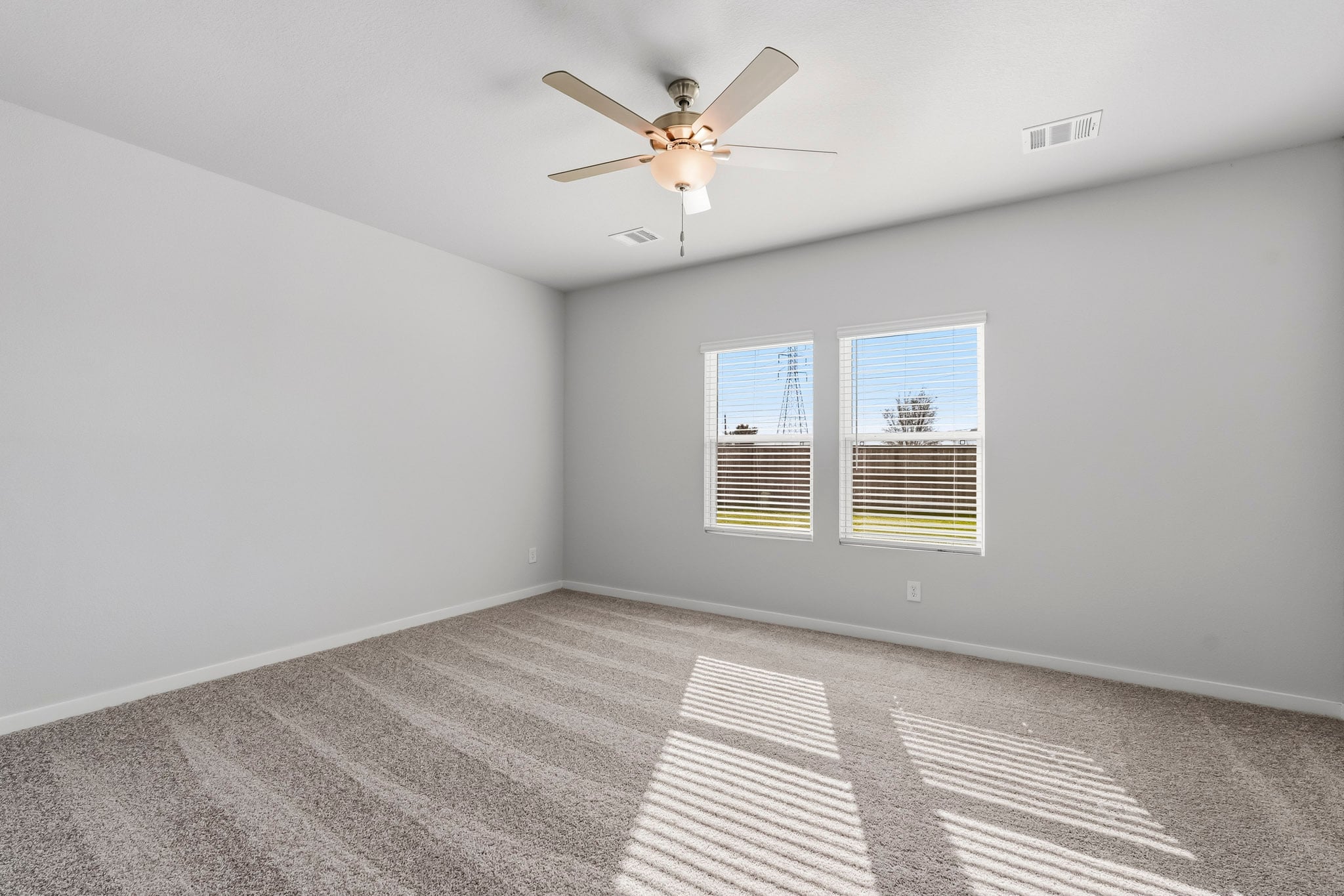 A ceiling fan in a room.