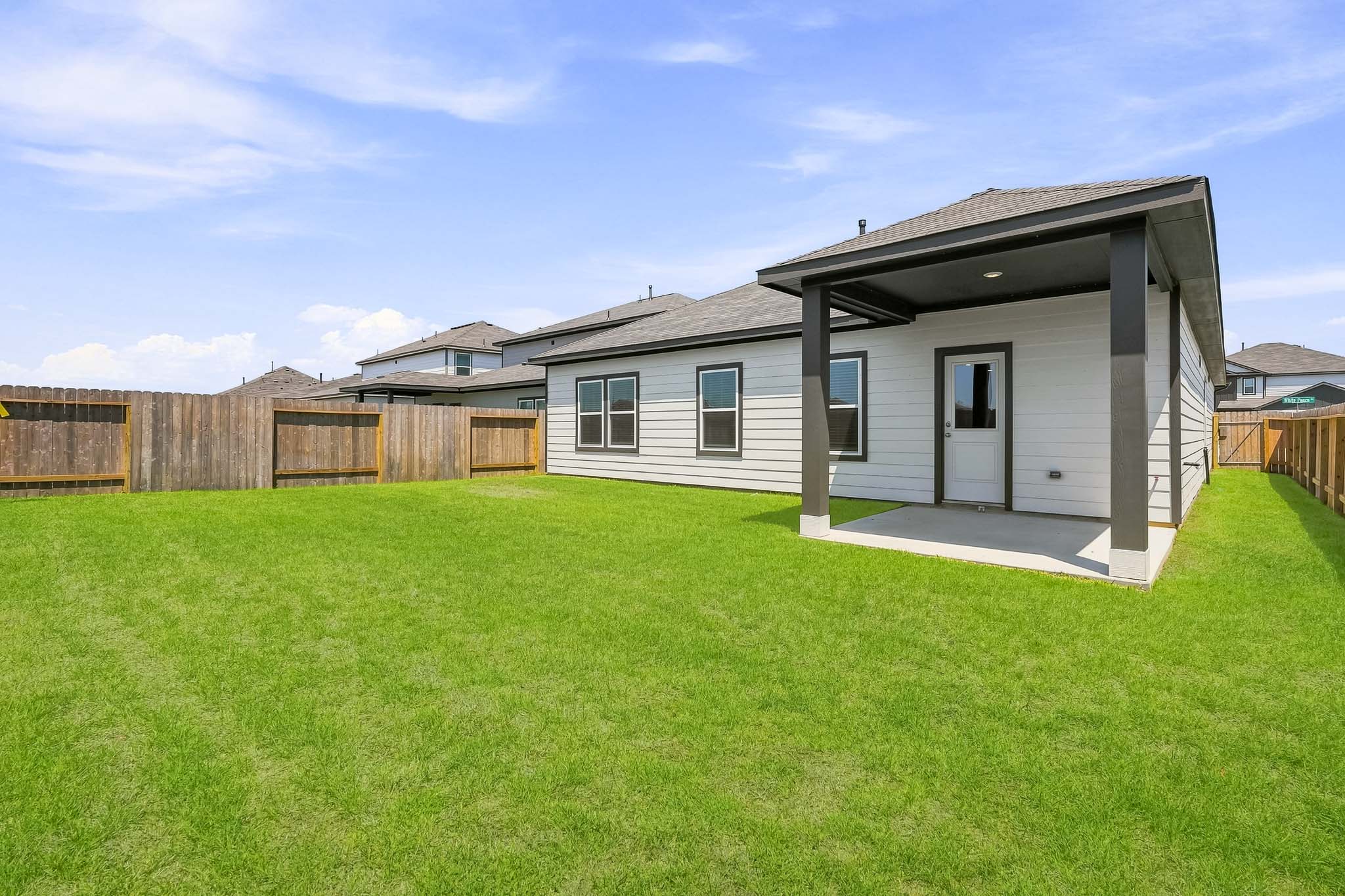 A house with a fence around it.