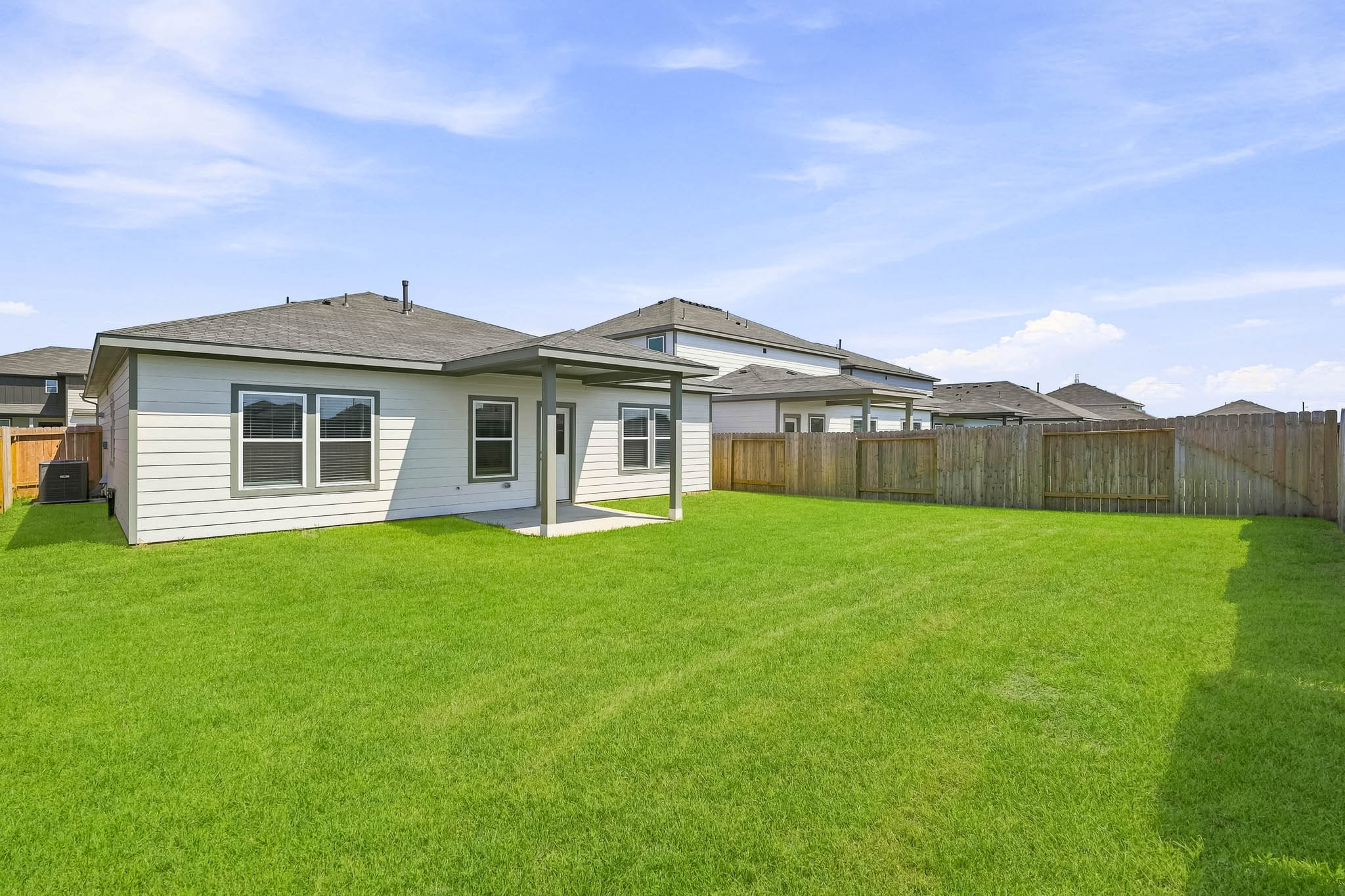 A house with a fence around it.