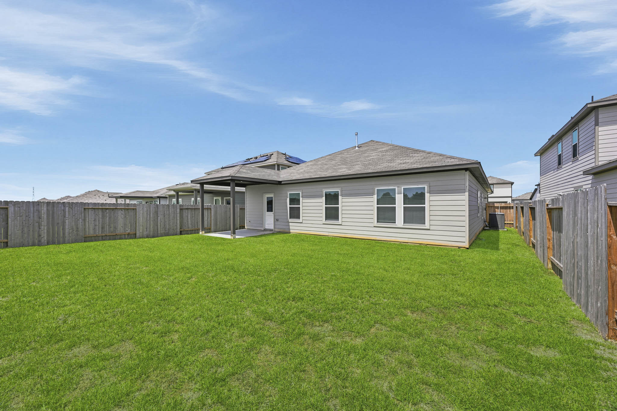 A house with a fence around it.