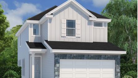 A white house with a garage.