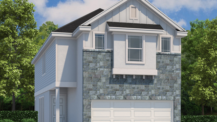 A grey house with a white garage.