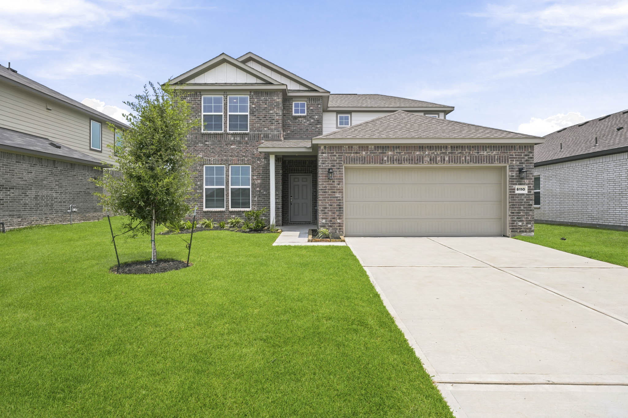 A house with a driveway.