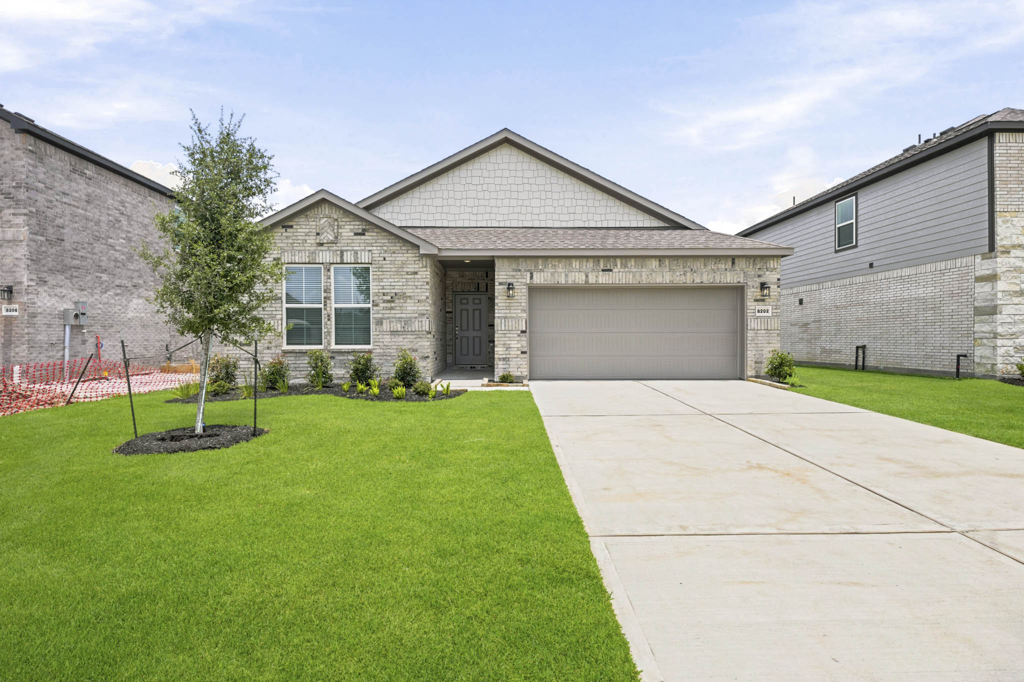 A house with a driveway.