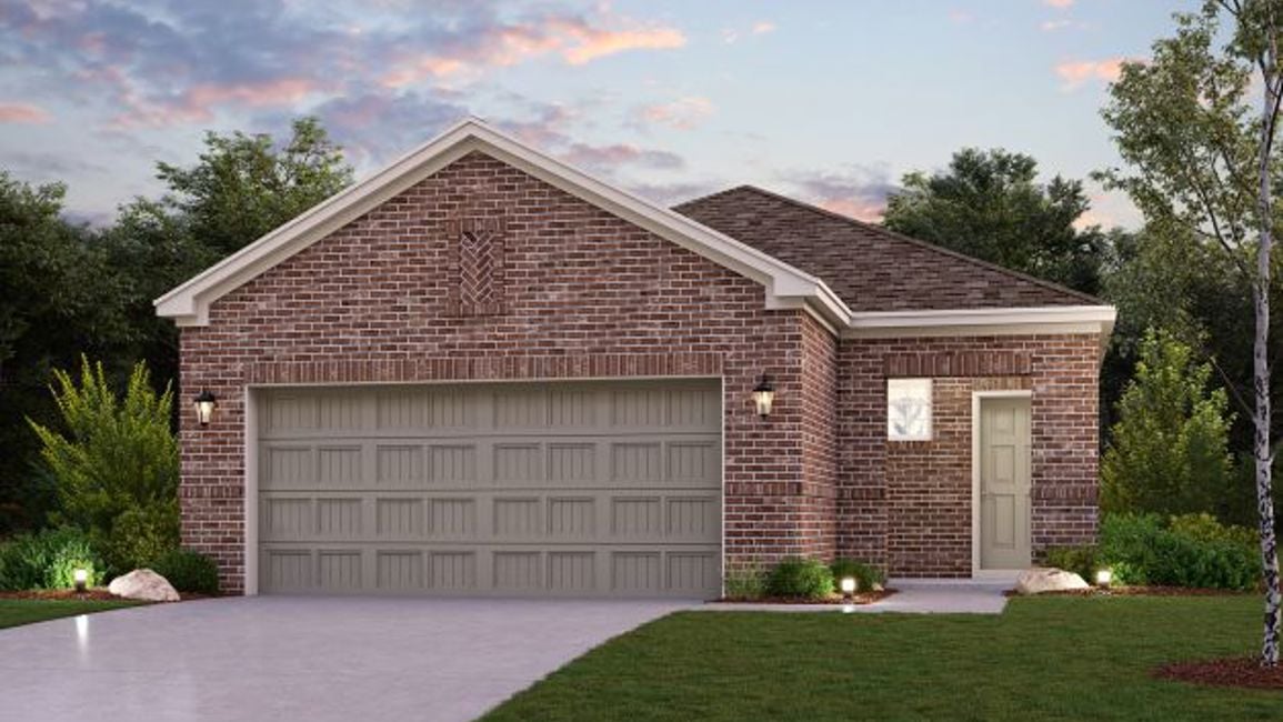 A brick house with a garage.