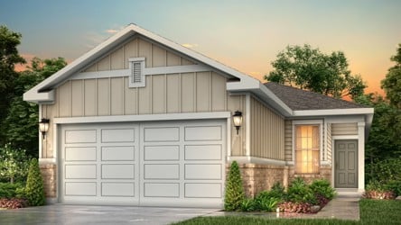 A house with garages and a driveway.