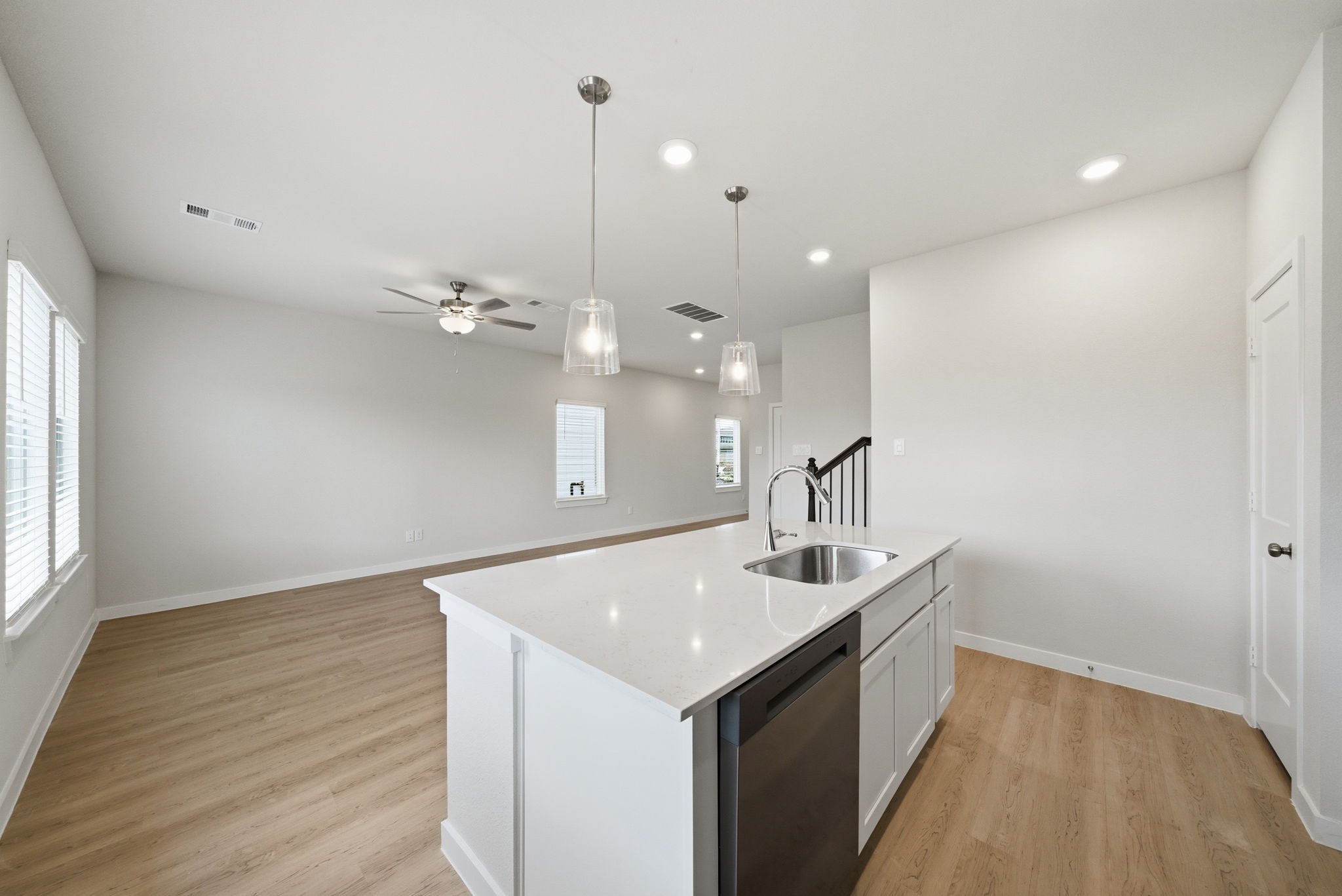 A kitchen with a sink and a countertop.