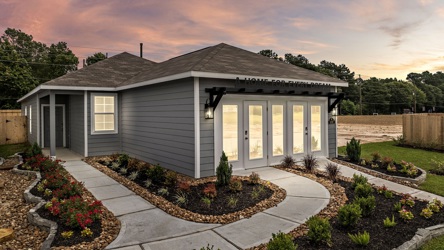 A house with a garden.