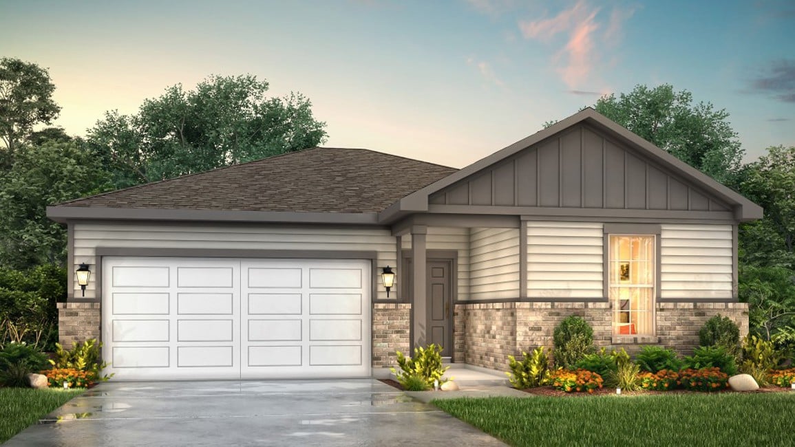 A house with garages and a driveway.