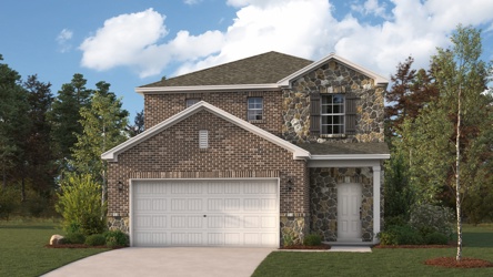 A house with a garage and trees.
