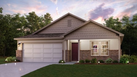 A house with a lawn in front of it.