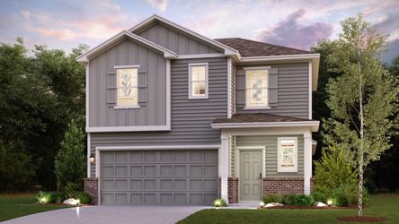 A house with trees in the back.