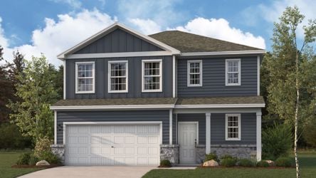 A grey house with a garage.