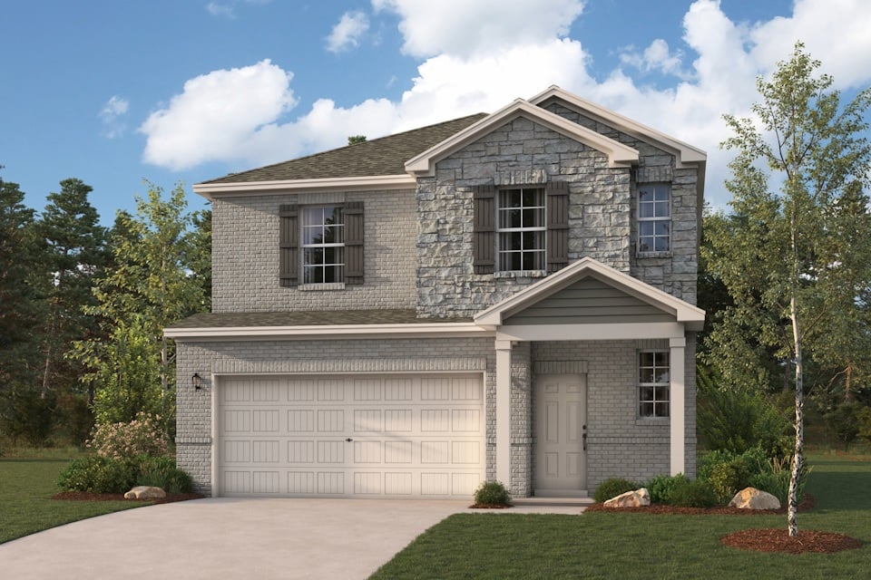 A grey house with a garage.