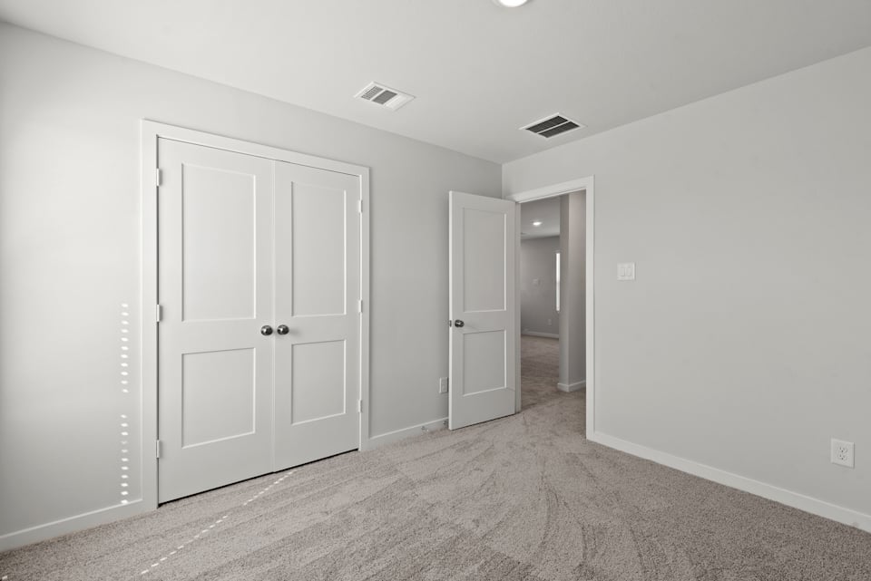 A room with white doors.